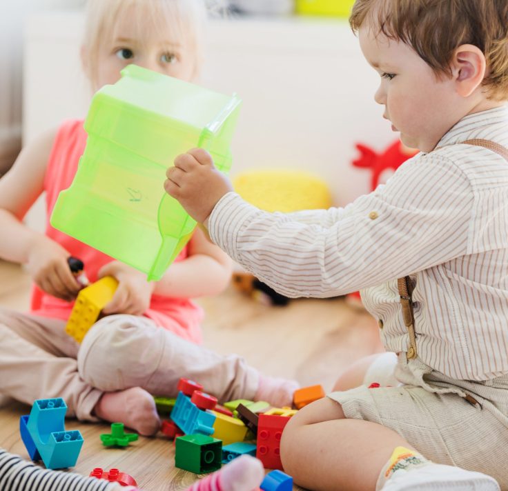 boy-holding-green-container